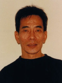 タン・ダウの顔写真